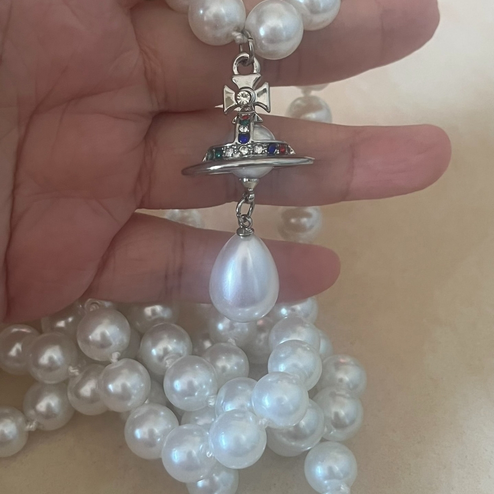 Elegant Silver and White Pearl Necklace